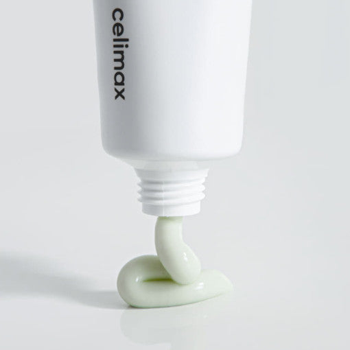 Celimax The Real Noni Energy Repair Creme, 50ml, zeigt die Verpackung und Textur des feuchtigkeitsspendenden Cremes in einer Nahaufnahme.