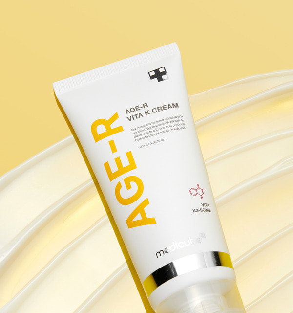 medicube AGE-R Vita K Creme in 100 ml, multifunktionale Vitamin K Pflegecreme in einem weißen Tiegel mit blauer Verpackung