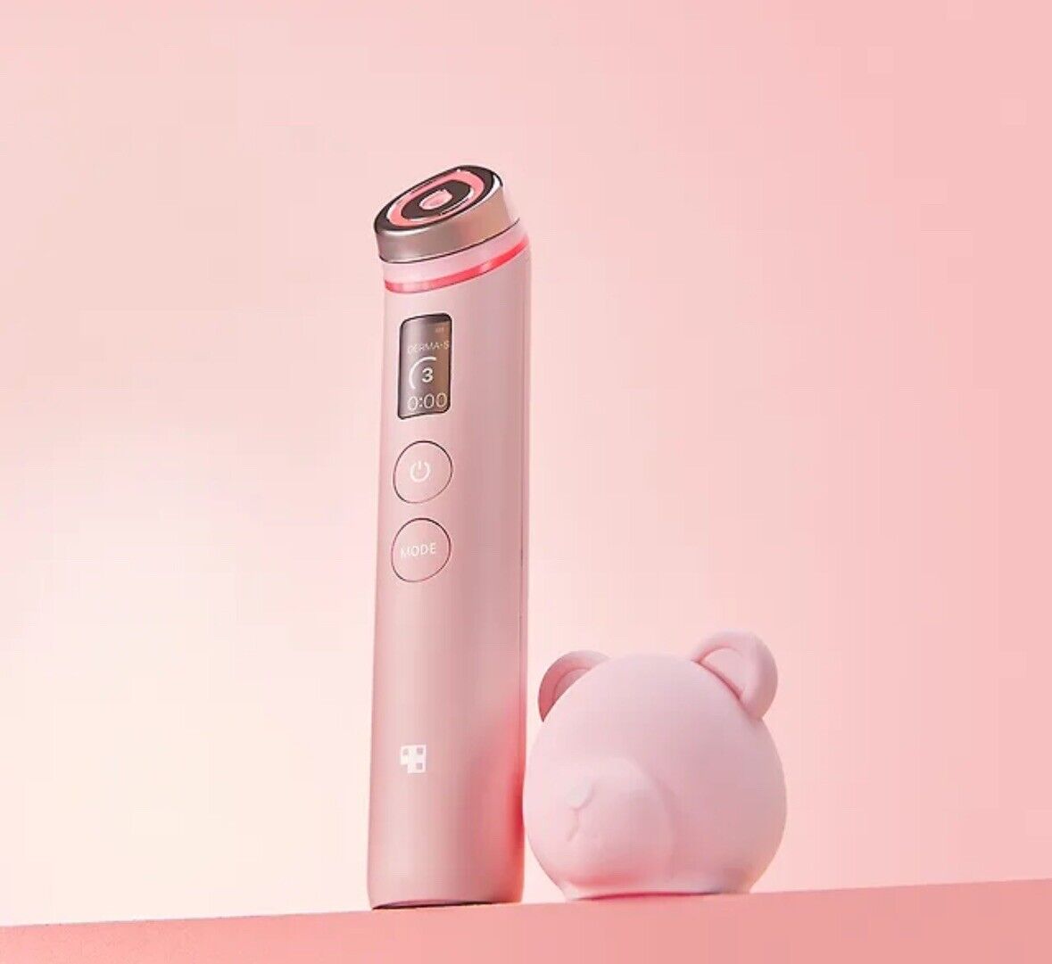 Medikube AGE-R Booster Pro Schönheitsgerät in Pink, mit ergonomischem Design und modernen Funktionen für die Hautpflege.