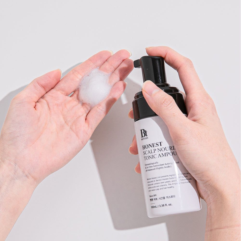 Benton Honest Scalp Nourishing Tonic Ampulle, 100ml, flüssiges Haarpflegeprodukt für die Kopfhaut, in einer transparenten Flasche.