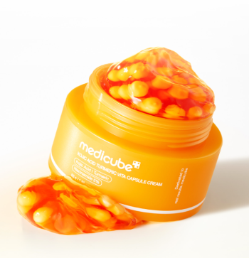 medicube Kojic Acid Turmeric Vita Capsule Cream, aufhellende Kapsel-Creme in 53 g, cremige Textur, sichtbare Kapseln in der Dose